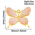 Colgante mariposa de esmalte rosa con marco dorado y lentejuelas para hacer joyería - Mariposa Rosa con Purpurina (S2945)