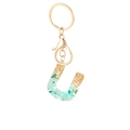 Letter U keychain with turquoise green stones and gold foil inside clear resin - Letter U Style
