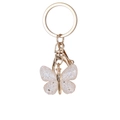 Detail of butterfly keychain with golden metal base, white patterned wings and lobster clasp - Gradient Magic Butterfly A