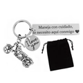 Macro detail of motorcycle keychain with Spanish engraving and black velvet pouch - Spanish Engraving Motorcycle (Velvet Bag)
