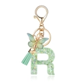 Green resin letter R keychain with sequins, green tassel and butterfly charm in gold finish - Green Butterfly R