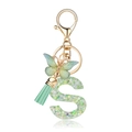 Green resin letter S keychain with colorful star sequins and a butterfly pendant - Green Butterfly S
