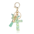 Green resin letter T keychain with glitter, butterfly charm, and mint green tassel - Green Butterfly T