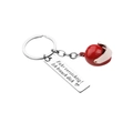 Dettaglio del portachiavi in acciaio con casco rosso e testo inciso in lingua tedesca - Rosso