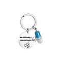 Stainless steel keychain featuring engraved inspirational quote and blue-white pill charm - Dark Blue