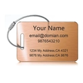 Macro detail of brushed rose gold luggage tag with steel cable loop and custom engraving - 85x55mm Rectangle Style / Rose Gold