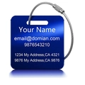 Detail of dark blue brushed metal luggage tag with wire cable and engraved text - 55mm Square Style / Blue
