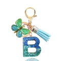 Teal glitter resin letter B keychain with butterfly pendant and blue suede tassel charm - Letter B