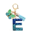 Letter E keychain with blue sequins resin, butterfly charm and light blue tassel - Letter E