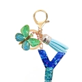 Detail of teal sequin resin letter Y keychain with blue tassel and butterfly charm - Letter Y