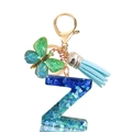 Detail of blue resin letter Z keychain with heart sequins, butterfly charm and blue tassel - Letter Z