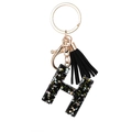Letter H keychain in black resin with gold sequins, holographic stars and black tassel - Letter H