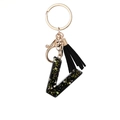 Black resin letter V keychain with gold sequins and a stylish black tassel pendant - Letter V