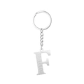Macro shot of silver stainless steel letter F keychain with brushed metal texture - Letter F