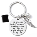 Sister stainless steel keychain with wing charm and pearl in black velvet pouch - Velvet Bag Packing / Walking Together Quote (sister002)