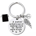 Polished silver stainless steel sister keychain with wing, pearl and velvet bag - Velvet Bag Packing / Friend to the Spirit (sister003)