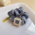 Detail of grey satin hair scrunchie with a central pearl and rhinestone ornament - Blue (A-3113-3)