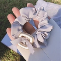 Elegant large silk scrunchie in mauve with gold square buckle and bow detail - Gray