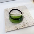 Minimalist dark green acetate hair tie with a translucent texture and black elastic band - Green