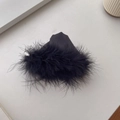 Detail of elegant black feather trim on a minimalist triangle shark hair claw clip - Black