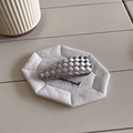 Detail of checkered weave hair clip in silver and black on a textured white surface - Teardrop / Silver Teardrop (D-4150-3)
