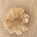 Close-up of cream organza hair scrunchie featuring a sparkling crystal heart decoration - Heart Rhinestone Style (A-3405-3)