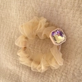 Macro detail of beige organza scrunchie with a large iridescent hexagonal gemstone - Square Rhinestone Style (A-3405-2)