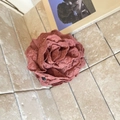 Detail of dusty pink rose hair claw with embroidered edges and realistic fabric petals - Brown