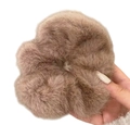 Oversized warm taupe faux mink fur scrunchie held in hand for fluffy volume display - Brown (D-4689-4)