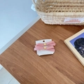 Detailed view of pink ribbon bow hair clips with gold center on a white card display - Grosgrain Ribbon Bow (D-5136-1) / Pink