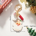 Leopard print Santa Claus keychain with red tassel and sparkling star glass ball - Santa Claus Style