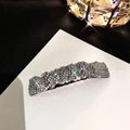 Glinsterende zilveren strass haarspeld met golftextuur en een glanzende metalen basis - Zilverwit Strass (B-1352)