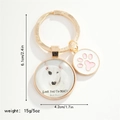 Close-up of Bull Terrier pendant with pink paw print charm showing product dimensions - Bull Terrier (LOVE YOU TO DEATH)