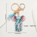 Llavero de elefante azul con estampado de flores de cerezo y borla de cuero elegante - Elefante 3