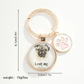 Detailed size view of Pug dog keychain with love me slogan and pink paw charm - Pug (LOVE ME)