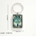 Detail view of rectangular wolf pendant keychain with measurements 7cm by 3cm - Mandala Bohemian Wolf Keychain (Style 3)