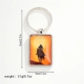 Detail view of western cowboy keychain showing 7cm x 3cm size and silver metal texture - Style 3 Keychain