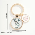 Golden puppy keychain with marble dalmatian round pendant and pink paw charm accessory - Dalmatian (FUNNY?)