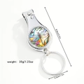 Detail view of dragonfly keychain nail clipper with dimensions 8.8cm and 35g weight - Floral Dragonfly (Style 9)
