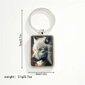 Wolf head pendant keychain with size specifications of 7cm by 3cm weighing 21 grams - Mighty Grey Wolf Portrait Keychain (Style 7)