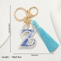 Detail showing dimensions of blue porcelain letter Z keychain with tassel and faux pearl - Letter Z