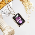 Macro shot of inspirational tennis necklace with purple Always Believe text on black pendant - Style 3 / Necklace
