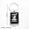Porte-clés baseball poli montrant les dimensions de 7cm et les détails du texte gravé - Style 2 Porte-clés