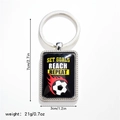 Dettaglio portachiavi calcio con slogan motivazionale Set Goals Reach Repeat in metallo - Stile 11 Portachiavi