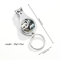 Detailed macro view of 8.8cm metal nail clipper featuring artistic Tai Chi elephant inlay - Artistic Yin Yang Elephant (Style 3)