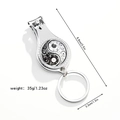 Detail showing dimensions of the Tai Chi pattern stainless steel nail clipper keychain - Yin Yang Fish Pattern (Style 4)