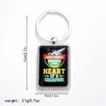 Dettaglio portachiavi calcio 7x3cm con scritta motivazionale per appassionati sport - Stile 3 Portachiavi