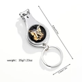 Three-in-one silver keychain with nail clipper, bottle opener, and golden butterfly 'R' motif - Letter R