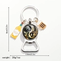 Detail of metal bottle opener keychain with Yin Yang dragon art and beer charms - Yin Yang Double Dragon (Style 8)