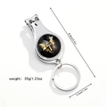 Three-in-one silver nail clipper keychain with dimensions 8.8cm and 35g weight - Letter T